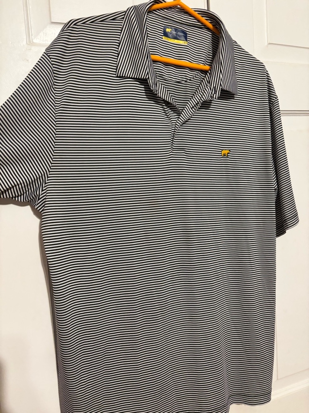 Striped Black and White Polo with Yellow Bear Logo